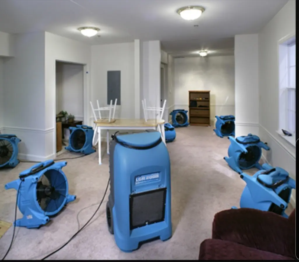 Air movers and dehumidifier setup for Water Damage Restoration in Williamsville